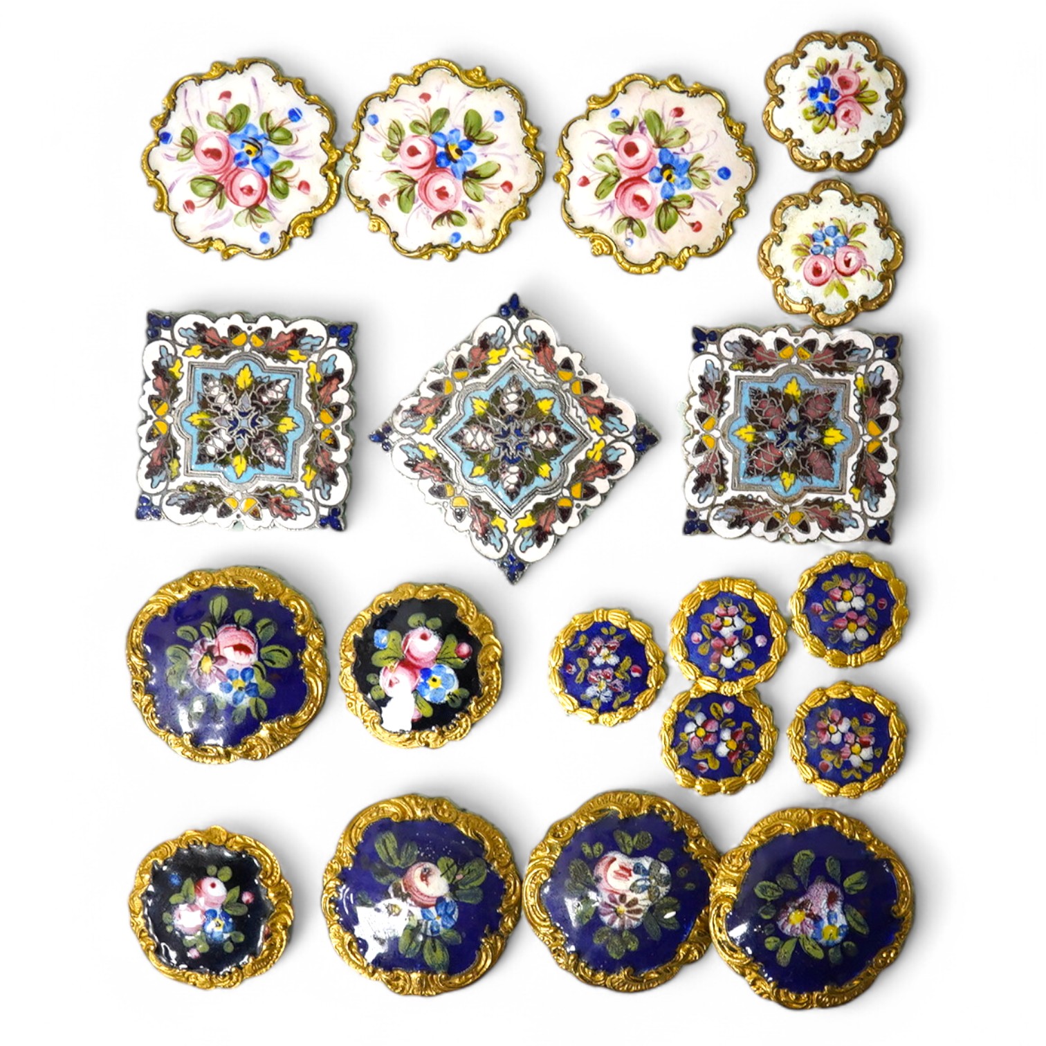 A group of nineteen, 19th century French enamelled gilt metal buttons, largest 29mm; Condition - good